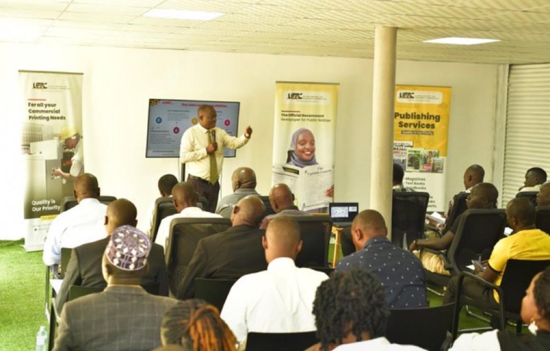 Sales Manager Mr Mawanda Rogers delivers a presentation to sales agents.